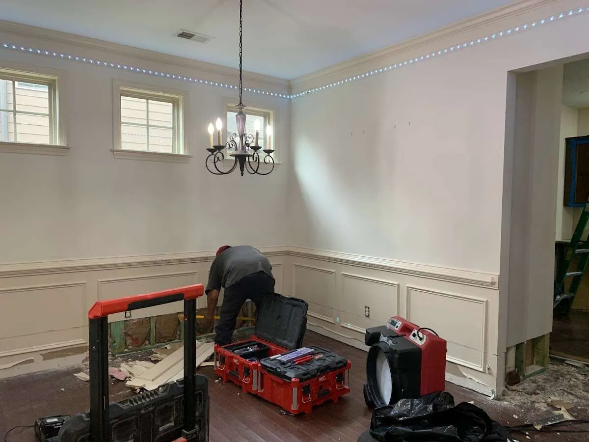 Restoration technician with professional equipment in South Kensington